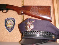 Police cap and rifle stock
