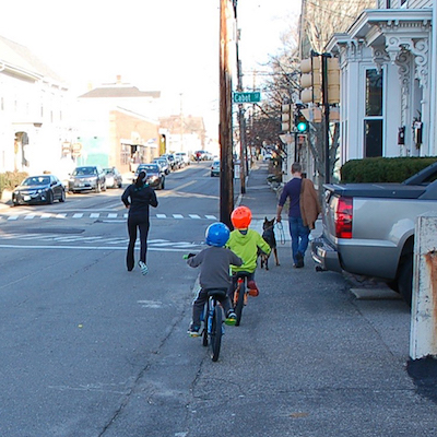 Kids riding their bikes on Islington Street