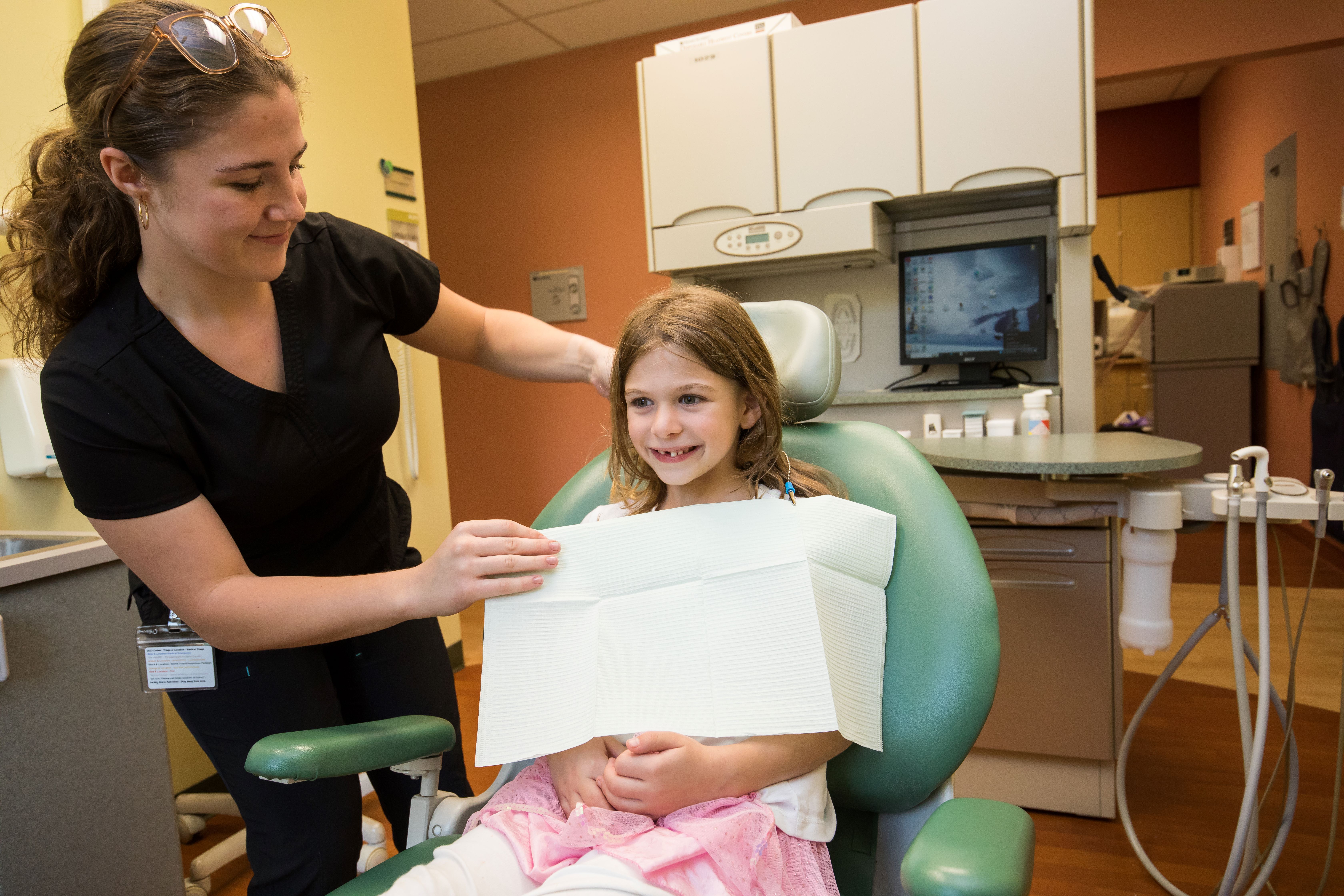 GSCH hygienist with young patient