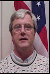 Commissioner Michael K. Hughes