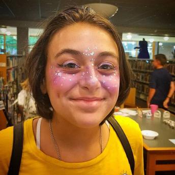 Teen with glittery makeup