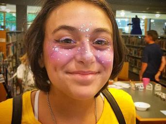 Teen with glittery makeup