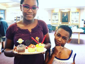Teen and Brother with Cupcakes
